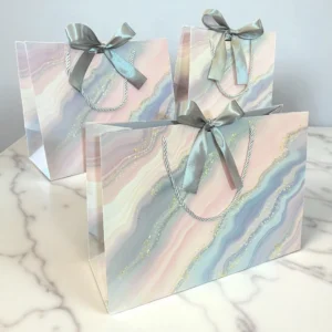 ถุงกระดาษลายหินอ่อนชมพูอมเทา ละมุนมาก แถมริบบิ้น (1 แพ็ค/มี3ใบ)